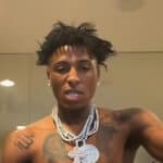 NBA YoungBoyのビーフや問題行動、内面的な葛藤を象徴する画像