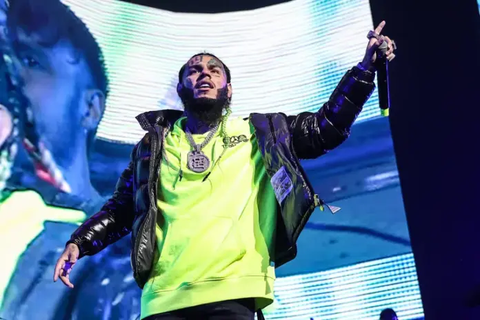 MIAMI, FLORIDA - December 17, 2021: Rapper Tekashi 6ix9ine performs at MiamiBash 2021 held at FTX Arena in Miami, Florida. (Photo by John Parra/Getty Images)