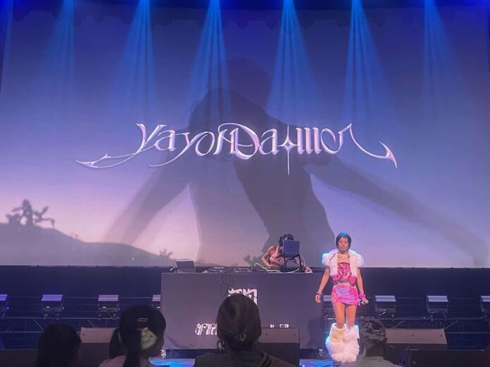 Yayoi Daimon on stage at OC Japan Fair/Freedom LA 2026. The moment she performs her new song 'Circulation' with short hair