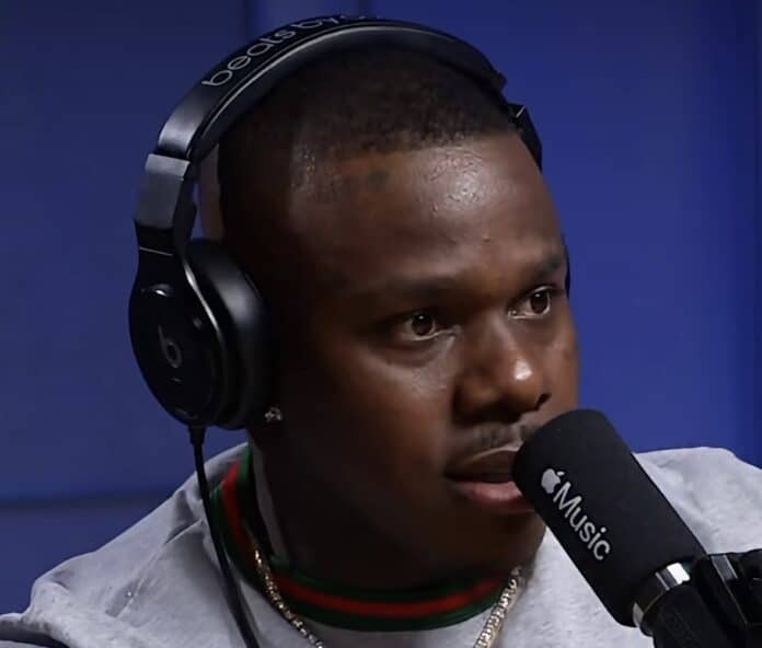2026年4月末、DaBabyがApple Music番組で「俺はDrake、Kendrick Lamar、J. Coleより上だ」と発言したシーンと、Big 3 がそれぞれ別の方向へ動く構造を象徴する4分割イメージ：DrakeのICEMAN直前沈黙、KendrickのGrand National Tour帝国、J. Coleの『The Fall-Off』最終アルバム、そしてBig 3の枠外から発言するDaBaby