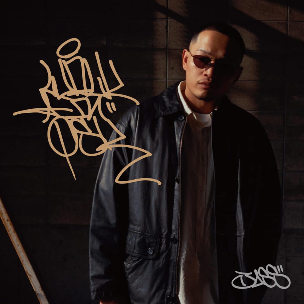 JASSの4thアルバム『WALK IN OSK』ジャケット。JASSがレザージャケットとサングラス姿で写る