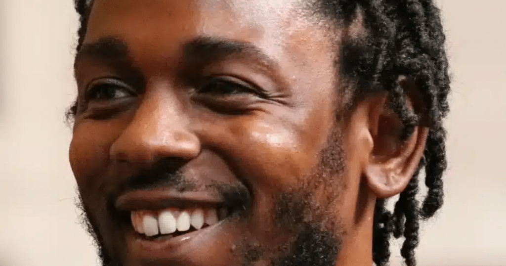 Close-up of Kendrick Lamar smiling at the 2018 Pulitzer Prize ceremony